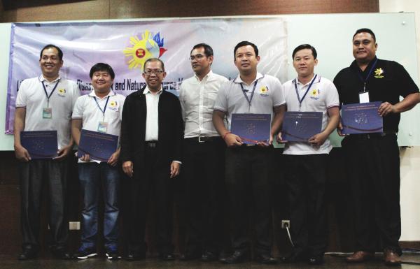 Delegates from the Kingdom of Cambodia pose with Engr. Raul Sabularse and Dr. En